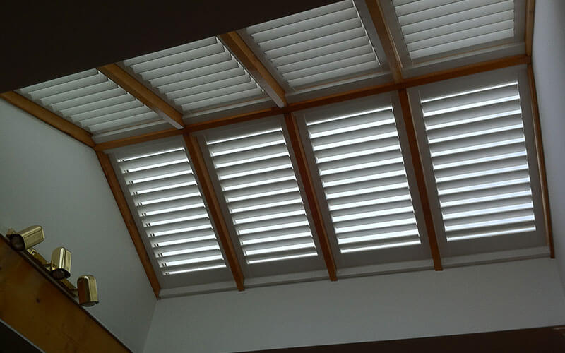 An an array of aluminium shutter blinds used as a skylight filter